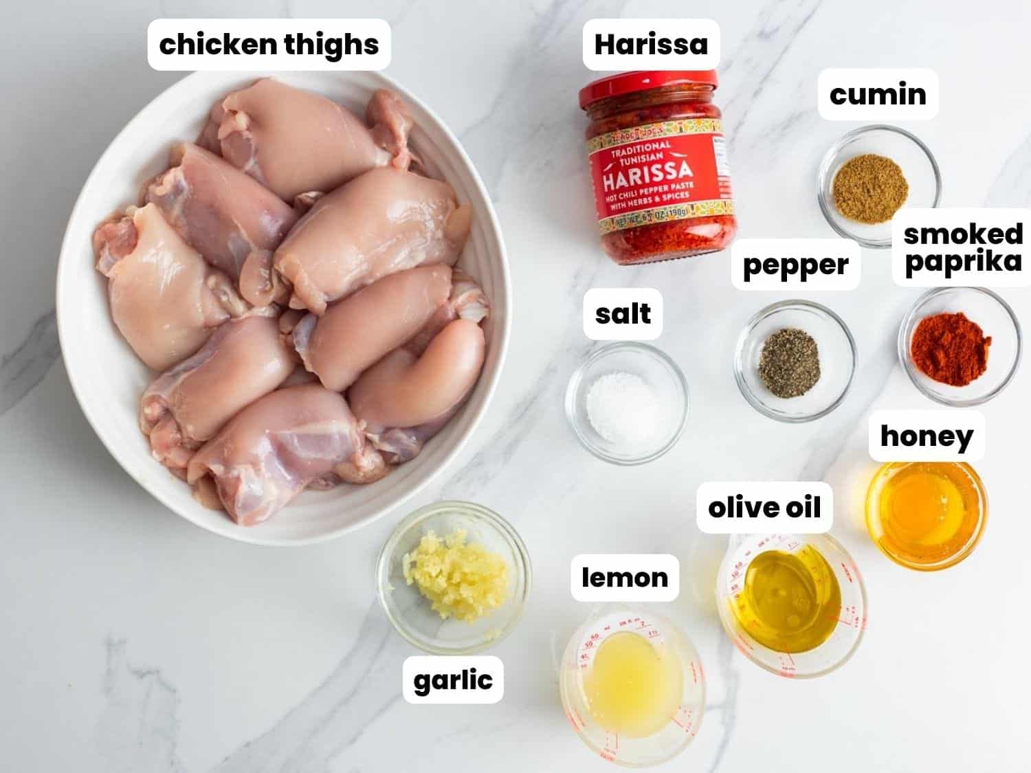 The ingredients needed to make marinated and grilled harissa chicken recipe. 